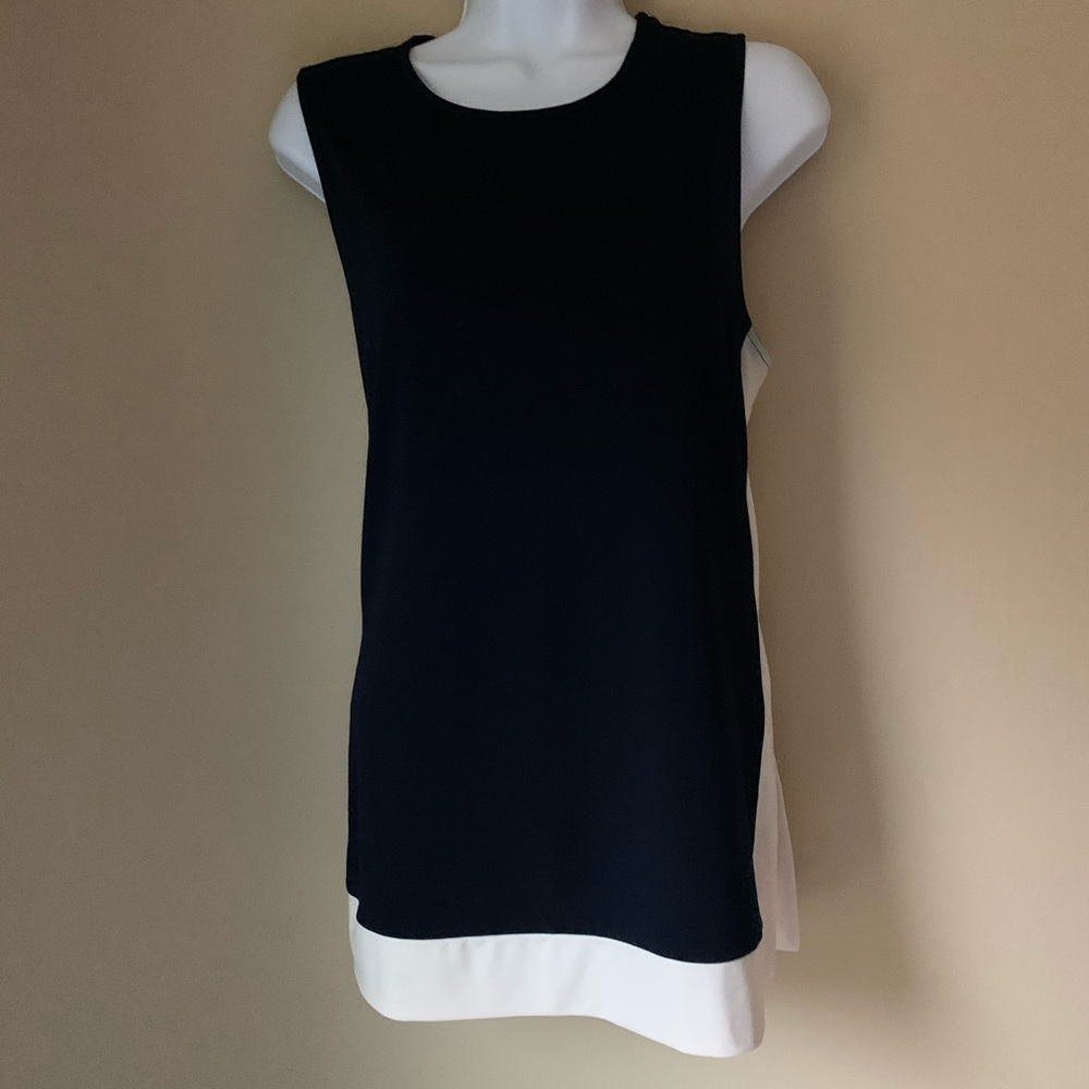 Long sleeveless blouse